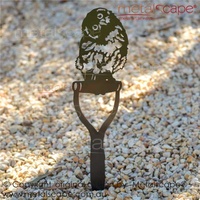 Boobook Fledgling (Mopoke) Owl on Spade Handle